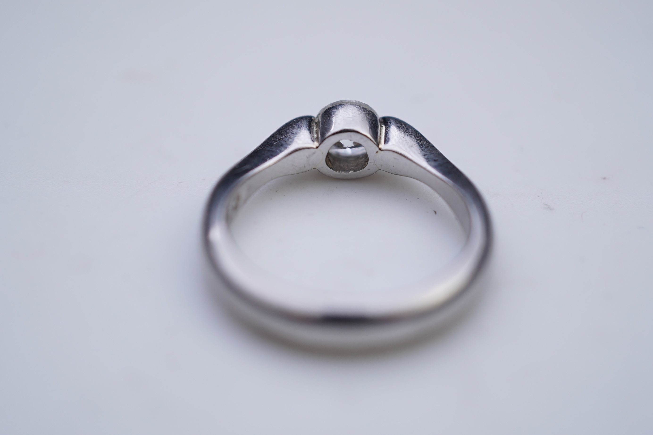 A diamond solitaire ring